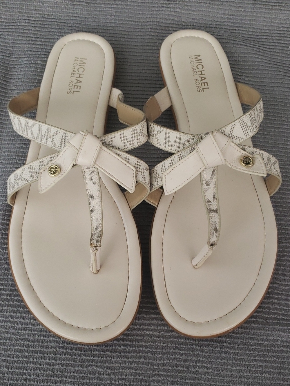 MICHAEL Michael Kors Cream Logo Thong Sandals with Gold Accent